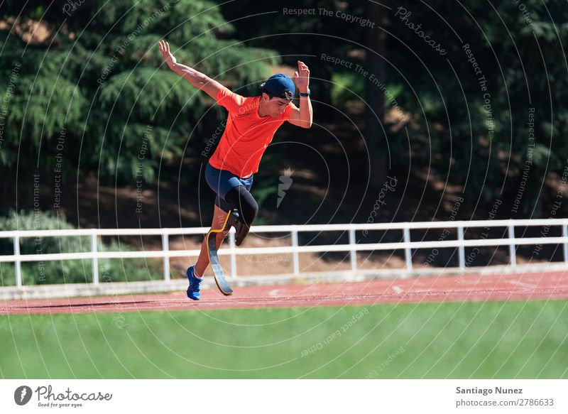 Disabled man athlete training with leg prosthesis. Man Running Runner Athlete Sports prosthetic Handicapped disabled paralympic amputation amputee invalid