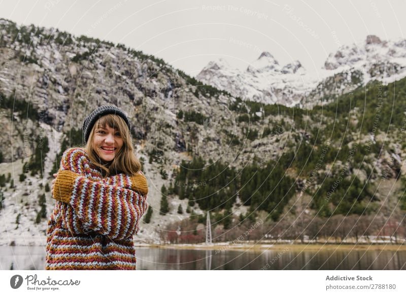 Young woman with crossed hands near mountain Woman Mountain Crossed Hand Pyrenees Lady Sweater Hat Hill Cold Looking into the camera Attractive Wonderful