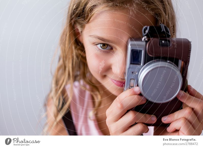 portrait of a beautiful kid using a camera Lifestyle Joy Beautiful Leisure and hobbies Vacation & Travel Trip Summer Child Business Camera Technology