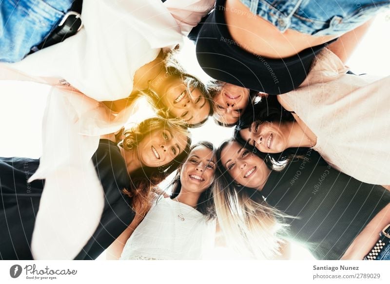 Women friends standing in circle. Human being Circle American Smiling Happy Peace Idea Bottom Woman Youth (Young adults) Adults Caucasian Exterior shot