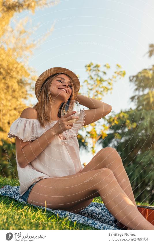 Beautiful woman having fun drinking wine. Woman Picnic Youth (Young adults) Park Happy Summer Human being Joy Adults Girl pretty Friendliness 1 Wine Glass