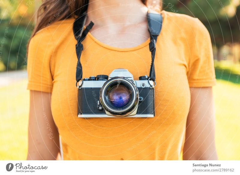 Close up of a photographer with her camera. Camera Photographer Professional Photography analogical Bag Easygoing casual dressing reflex caucasian ethnicity