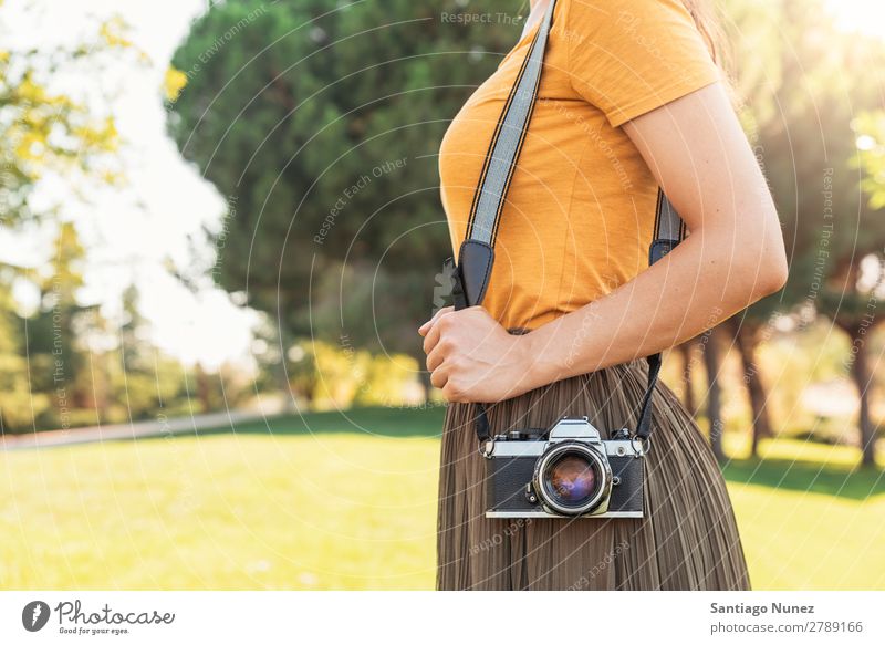 Close up of a photographer with her camera. Camera Photographer Professional Photography analogical Bag Easygoing casual dressing reflex caucasian ethnicity