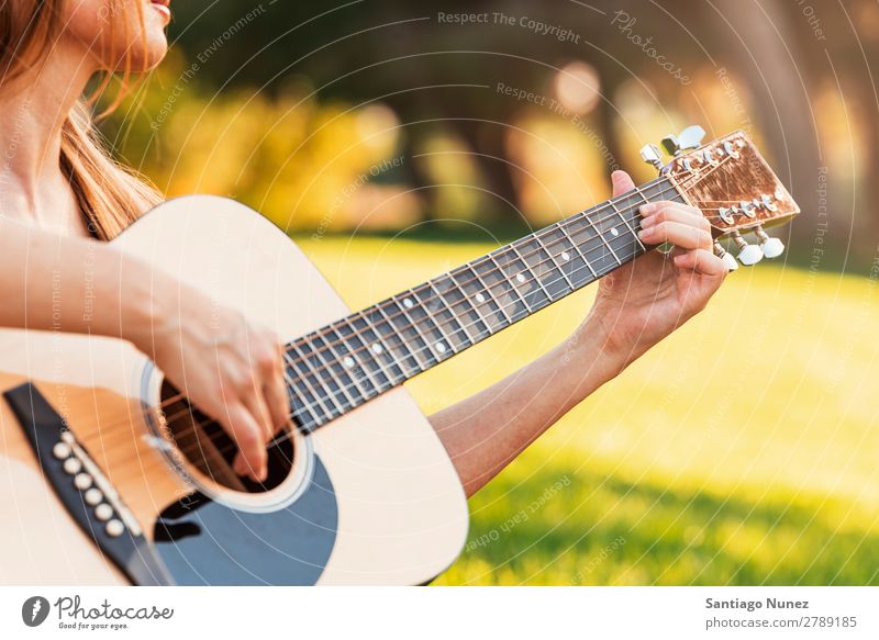 Beautiful woman playing guitar. Woman Picnic Youth (Young adults) Guitar Guitarist Park Happy Summer Human being Joy Playing Music Adults Girl pretty