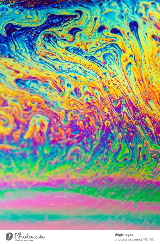 Colour spectrum abstract background. Rainbow colours. Art Bright Crazy Blue Consistency oil Soap bubble psychedelic iridescent light liquid water colorful