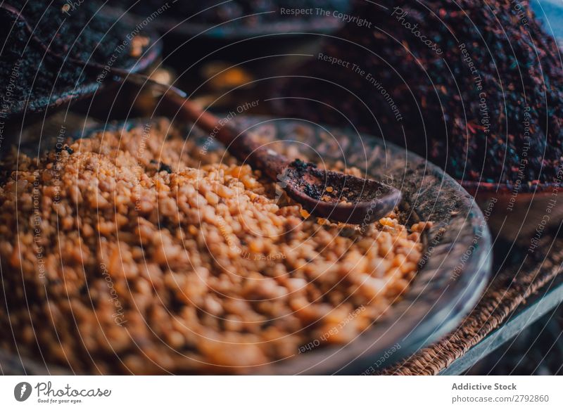 Dry spices on counter Markets Herbs and spices Multicoloured Aromatic East Exceptional Bowl Red Orange Bazaar Tradition Shopping Storage Tourism Chechaouen