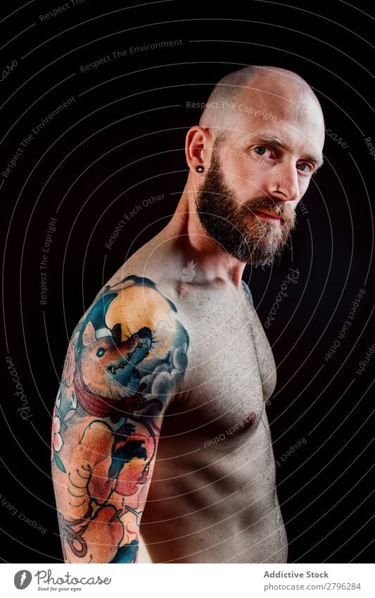 Bearded muscular man with tattoo attractive Vector Image