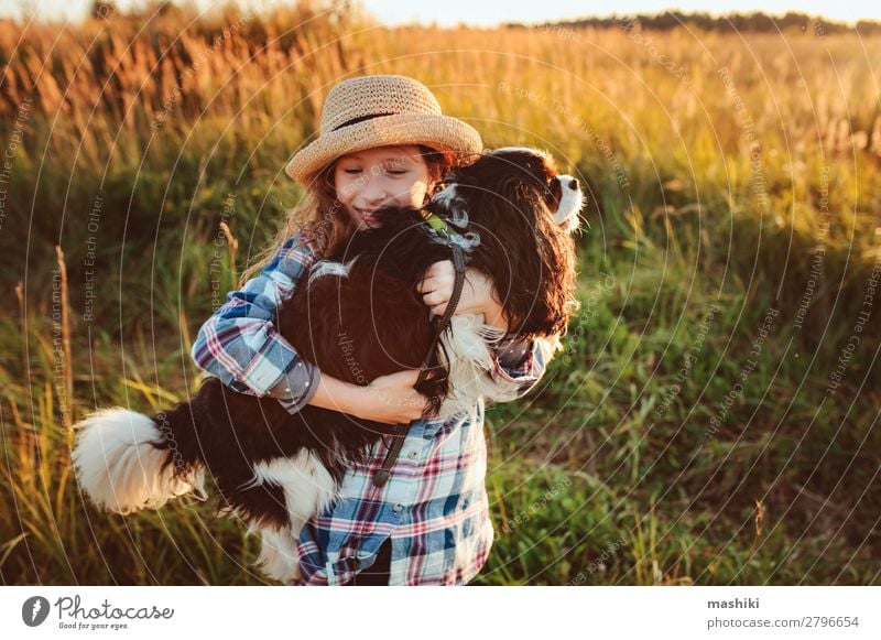 happy child girl enjoying summer vacations with her dog Lifestyle Joy Leisure and hobbies Playing Vacation & Travel Trip Adventure Freedom Expedition Summer