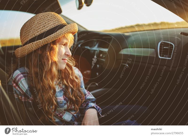happy child girl relaxing in car during summer road trip Lifestyle Joy Happy Leisure and hobbies Playing Vacation & Travel Trip Adventure Freedom Expedition