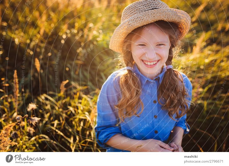 happy kid girl in blue dress and straw walking on summer Lifestyle Joy Happy Relaxation Leisure and hobbies Playing Vacation & Travel Freedom Summer Child