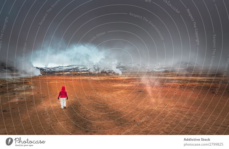 Traveler walking in valley near geysers traveler Valley Geyser Iceland Nature Landscape Hot Steam Geology Geothermy Heat Tourism Volcanic Trip Wanderlust Rough