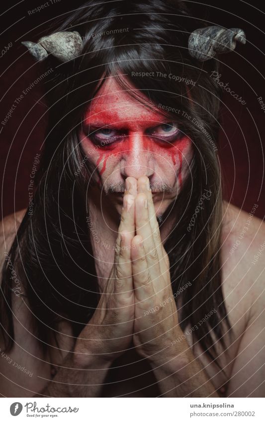 devil in disguise Make-up Masculine Man Adults Face Hand 1 Human being 30 - 45 years Stage play Brunette Long-haired Observe Think Authentic Threat Dark Creepy