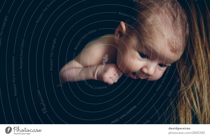 Baby holding on to her mother's shoulder Lifestyle Happy Beautiful Child Human being Woman Adults Mother Family & Relations Love Carrying Embrace Authentic Dark