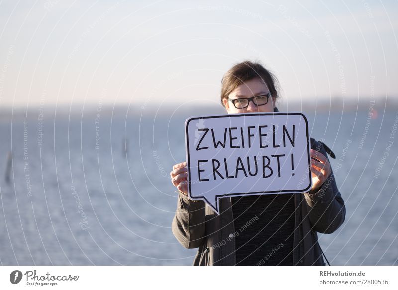 Woman with speech bubble Text Speech bubble To hold on Signage Signs and labeling Characters Adults Feminine communication portrait stop Nature Lake Eyeglasses