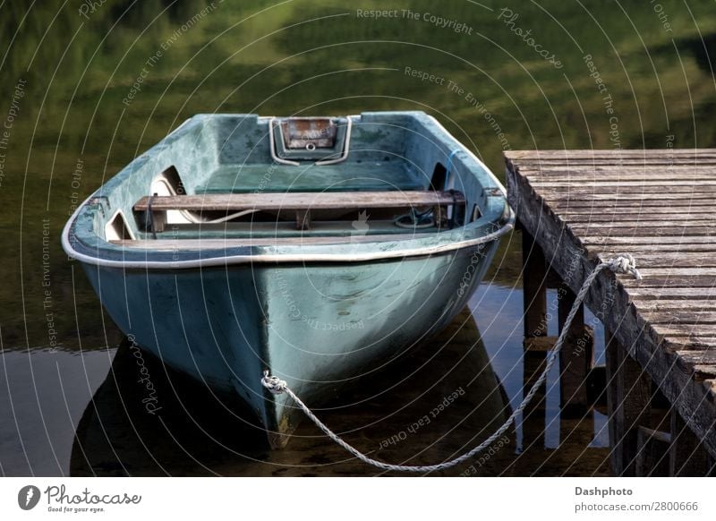 Old Rowing Boat Moored at a Scottish Highland Loch Leisure and hobbies Vacation & Travel Beach Waves Rope Plant Grass Forest Coast Lake Fishing boat Rowboat
