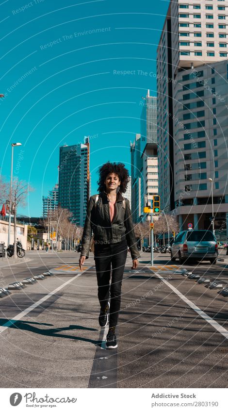 Woman with afro hair walking through the streets African American Bag Beautiful Black Business Easygoing City Curly Fashion Girl Hair Happy Lifestyle