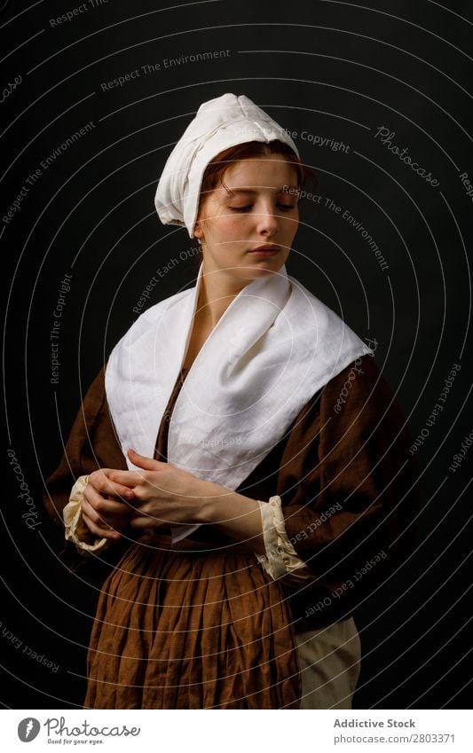 Medieval maid with closed eyes medieval Woman Closed eyes Clothing historical Dress Costume maiden Car Hood Renaissance Vintage Retro peasant To enjoy Baroque