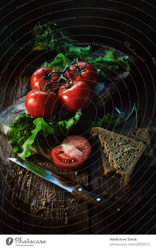 Fresh tomatoes on wooden table Tomato Table Wet Napkin bunch Healthy Red Food Vegetable Organic Mature Ingredients Vegan diet Half Cut whole Diet Raw Kitchen