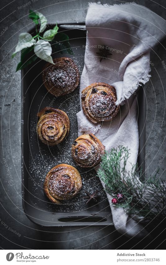 Herbs and napkin near cinnamon rolls Tray Napkin Roll Food Meal Fresh Rustic Gourmet Tradition Dish Cooking Baked goods Delicious Tasty yummy Dog food Sugar