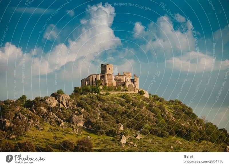 Beautiful Spanish old castle over a hill and a beautiful sky Vacation & Travel Tourism Mountain Landscape Sky Clouds Hill Rock Palace Castle Ruin Building