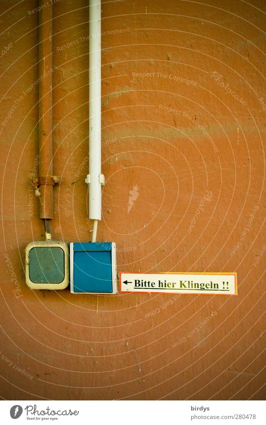 Bell? Technology Wall (barrier) Wall (building) Facade Switch Cable Signs and labeling Signage Warning sign Authentic Original Blue Brown Town