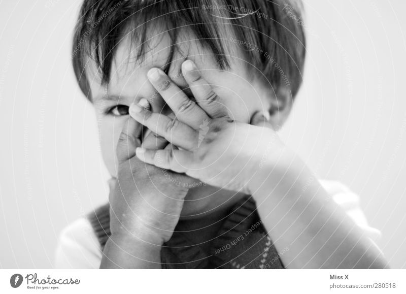 Don't look Human being Child Toddler Infancy Eyes 1 1 - 3 years Hair and hairstyles Looking Cute Curiosity Timidity Hand Black & white photo Close-up