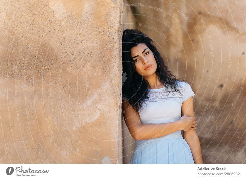 Beautiful ethnic woman near shabby wall Woman Moroccan Wall (building) grungy Ethnic Elegant Lean Exterior Building Youth (Young adults) Model Thin Shabby Dirty
