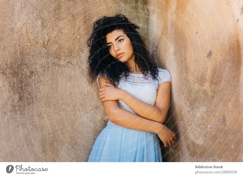 Beautiful ethnic woman near shabby wall Woman Moroccan Wall (building) grungy Ethnic Elegant Lean Exterior Building Youth (Young adults) Model Thin Shabby Dirty