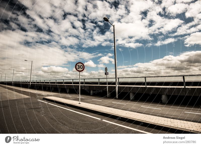 //7(30)iI Environment Air Sky Clouds Sun Summer Beautiful weather Transport Traffic infrastructure Street Lanes & trails Road sign Sign Signs and labeling