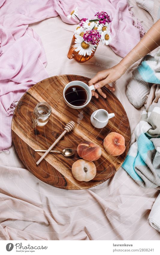 Cozy flatlay of wooden tray with cup of coffee, peaches, creamer Cup Mug flat lay Bedroom Breakfast Espresso Syrup Spoon Fruit Peach Bouquet Winter Autumn Woman