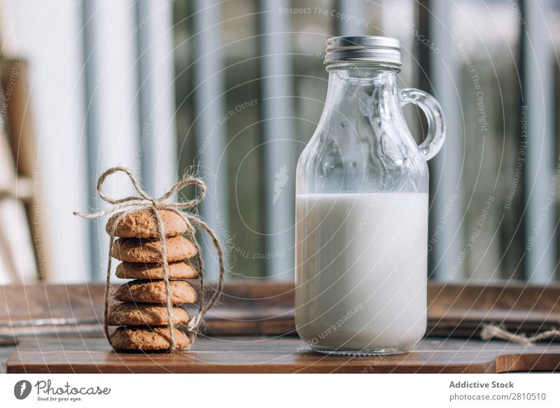 Bottle of milk and cookies Milk Cookie Sweet Glass Food Table Snack Dessert White Fresh Drinking Delicious To feed Kitchen Stack Breakfast Sugar Home Tasty