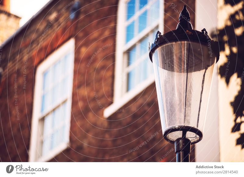 Lamppost over house. Lamp post House (Residential Structure) London Street England British City Architecture Great Britain Europe Building Vintage Town Light