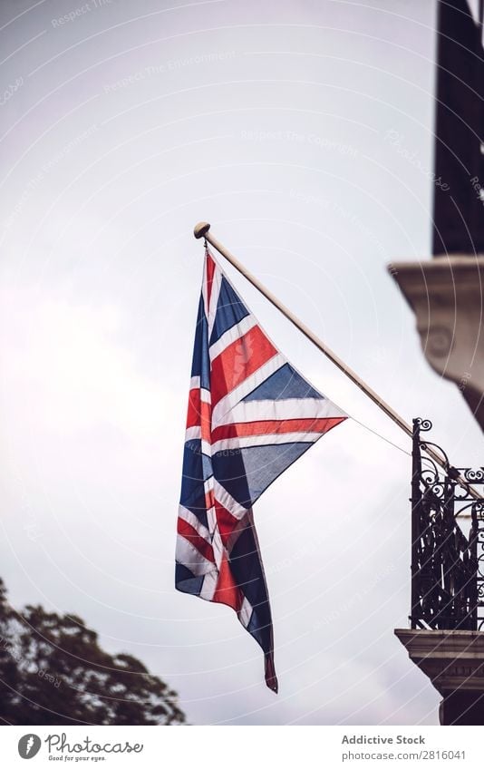 British flag Flag Sky Great Britain Hang Building patriotic national Wall (building) Street City Town Old London Vertical Exterior shot Deserted Copy Space