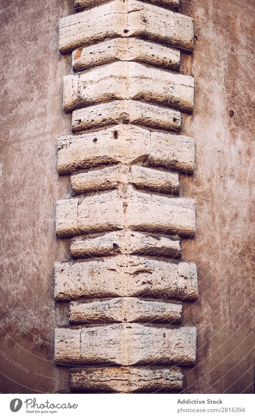 Corner of a building texture background. Rome, Italy Building Brick Stone Surface Decoration Cement Rough Square Old Ornament Tile Brown Masonry brickwork