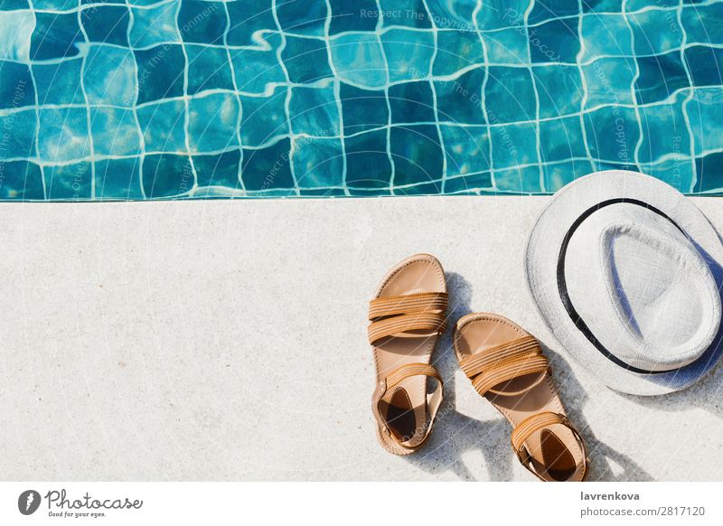 flat lay with woman's sandals and hat front of the pool Hotel Exterior shot Sports Swimming & Bathing Background picture Blue Hat Vacation & Travel