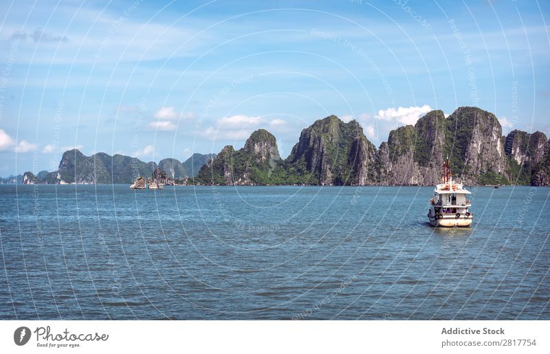 Picturesque sea landscape. Ha Long Bay, Vietnam Halong bay Asia Island Landmark Blue asian Cruise Green Tree South Vietnamese Watercraft Dinghy Wood