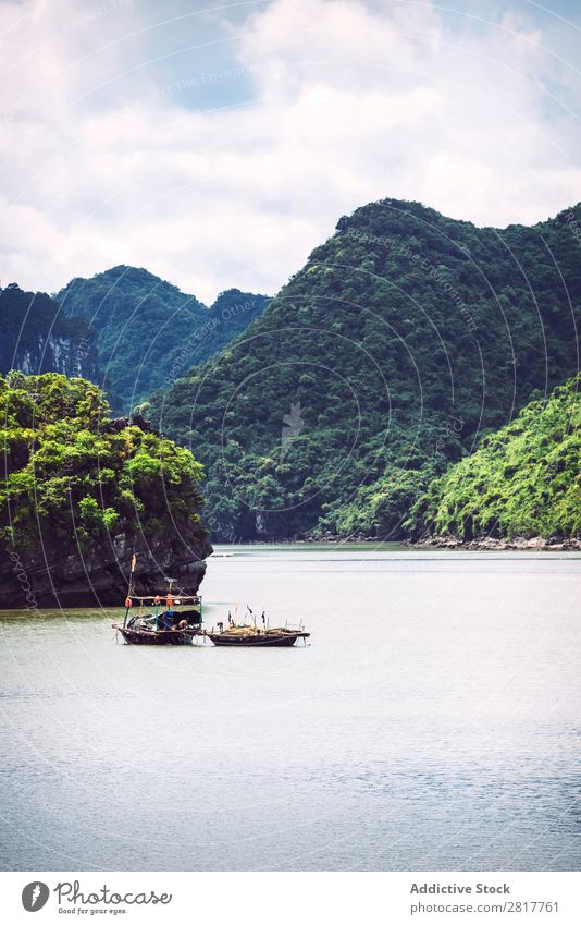 Picturesque sea landscape. Ha Long Bay, Vietnam Halong bay Asia Island Landmark Blue asian Cruise Green Tree South Vietnamese Watercraft Dinghy Wood