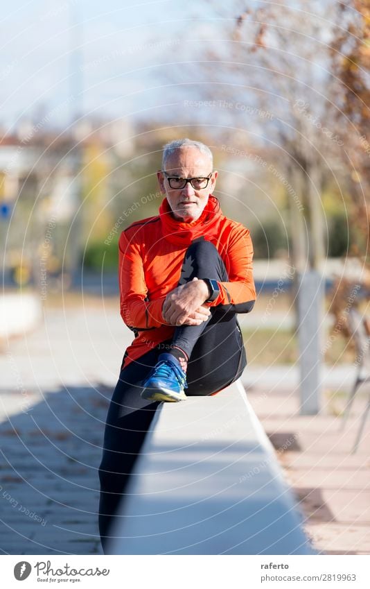 Front view of one senior man wearing sportswear and eyeglasses Lifestyle Relaxation Sports Human being Masculine Man Adults Male senior 1 60 years and older