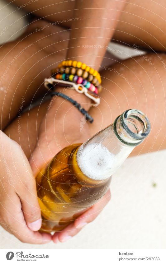 una cerveza por favor Beer Bottle Bottle of beer Woman Human being Hand Fingers To hold on Sit Beach Alcoholic drinks Vacation & Travel Sandy beach Beverage
