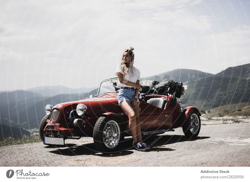 Woman standing at vintage car Car Vintage Street Red Lean Car Hood Stand Mountain Girl Youth (Young adults) Drive Vehicle Lifestyle Summer Beautiful Retro