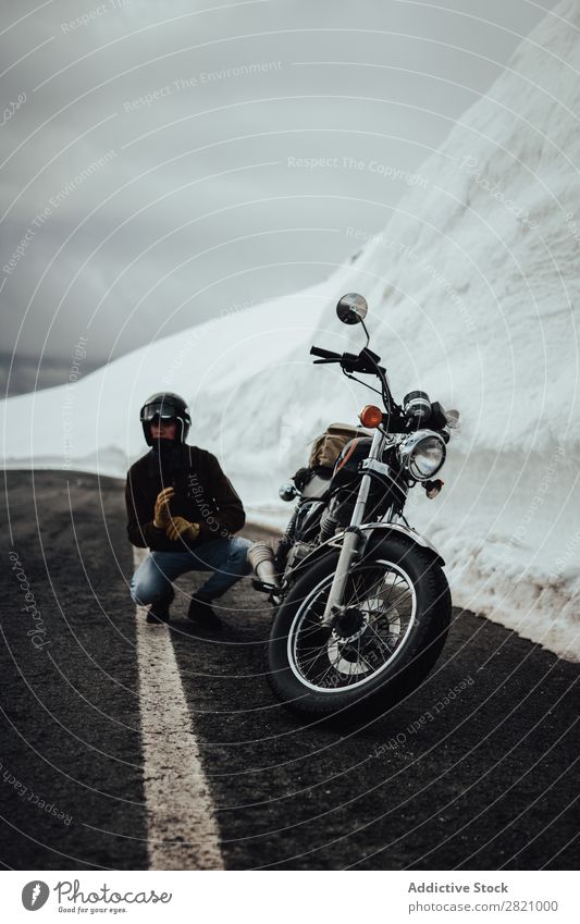 Man with motorcycle near glacier Nature Motorcycle Vacation & Travel Posture Street Transport Trip North Rider Snow Mountain Adventure Freedom Sit Landscape