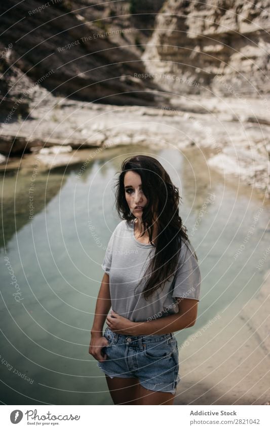 Sensual woman at lake Woman Cliff Nature Lake Water To enjoy pretty Looking into the camera Stand Youth (Young adults) Beautiful Girl Summer Sunbeam Lifestyle