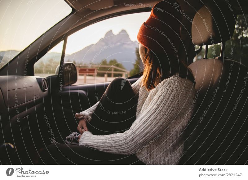 Woman in car looking out window Car Window Landscape Vacation & Travel Human being Street Trip Vehicle Freedom Rest Relaxation admiring enjoying Vantage point