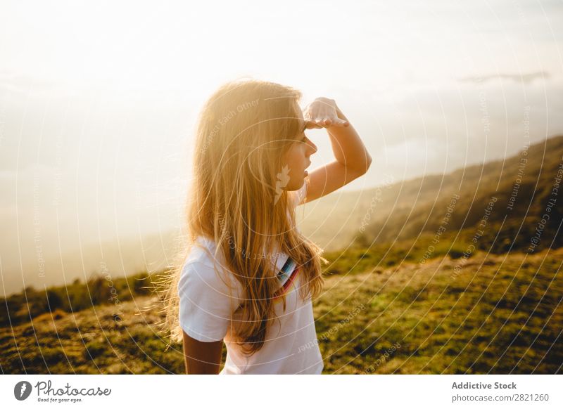 Young woman looking into distance Woman Nature enjoying Far-off places Freedom Lifestyle Human being Leisure and hobbies Sunlight Sunbeam Day Beautiful Lovely
