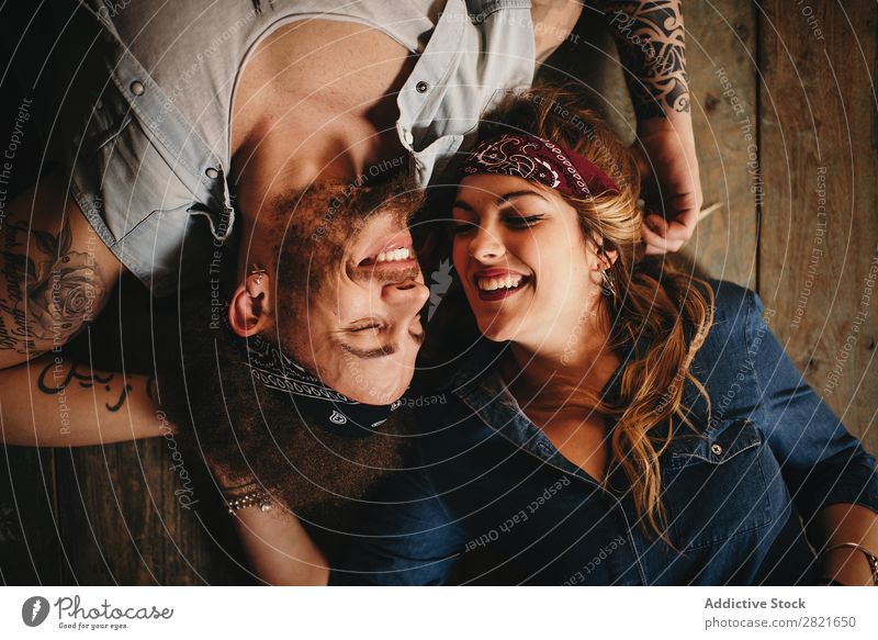Happy couple on wooden background Couple Portrait photograph Above Wood Background picture Lie (Untruth) Bird's-eye view Smiling Happiness Cheerful Headband