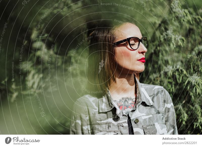 Stylish tattooed woman in nature Woman Style Nature Green enjoying Person wearing glasses eyes closed Tattoo Stand Attractive Beautiful Youth (Young adults)