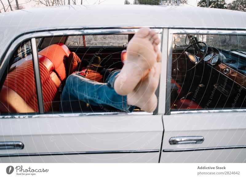 Man sleeping in vintage car Car Vintage Retro Sleep Lie (Untruth) Rest Relaxation Legs Hat White Vehicle Classic Old Adults Vacation & Travel Human being