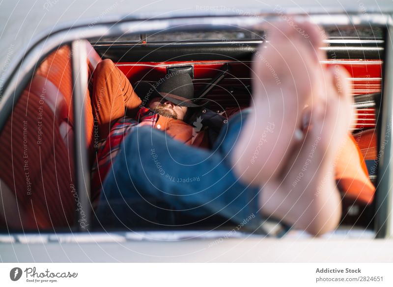 Man driving vintage car - a Royalty Free Stock Photo from Photocase
