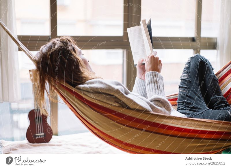 Woman in hammock relaxing with book Home Relaxation Lie (Untruth) Hammock Reading Book Literature Lifestyle Beautiful Room Human being Easygoing Adults