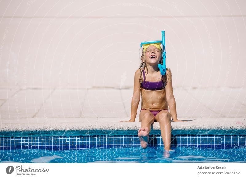 Kid playing in pool Child poolside Splashing Playing having fun Vacation & Travel Summer Cheerful Water Leisure and hobbies Joy splashes Playful Action